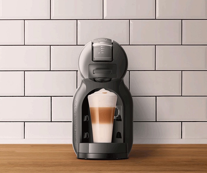 Primer plano Máquina de Café Mini Me NESCAFÉ® Dolce Gusto® Negra y Gris